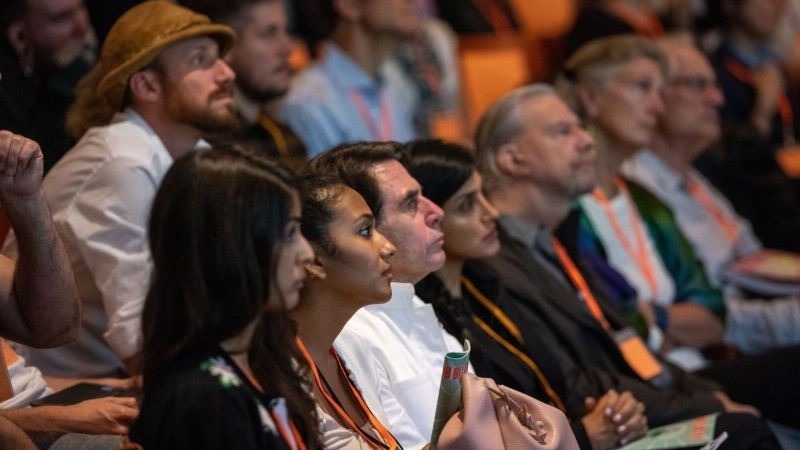 Audience listening intently at a Horizons conference session